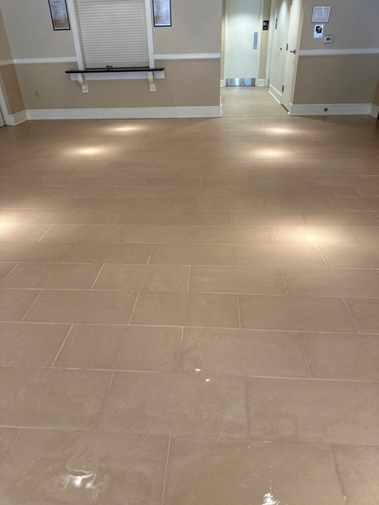 carpet masters doing a tile and grout cleaning project.