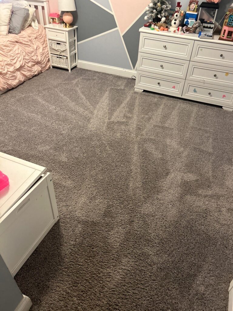 carpet masters doing a carpet cleaning project in a bedroom, ensuring a fresh and clean carpet.